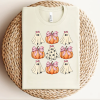 custom halloween pumpkin coquette pink and gosths natural t-shirt